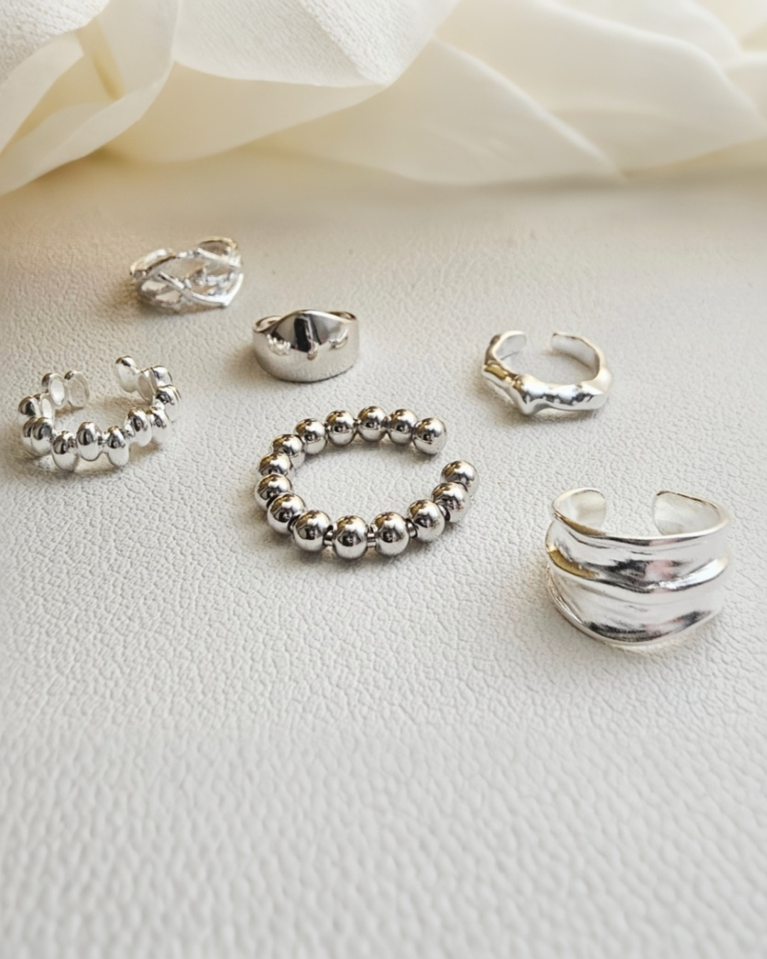 Silver bold earcuffs