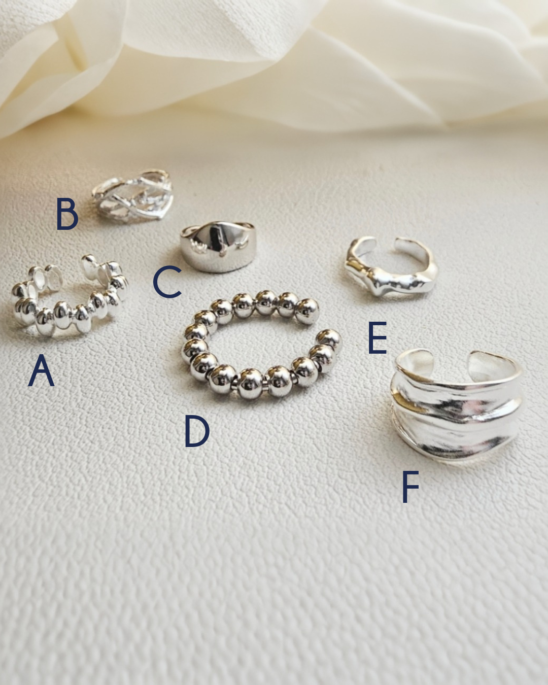 Silver bold earcuffs