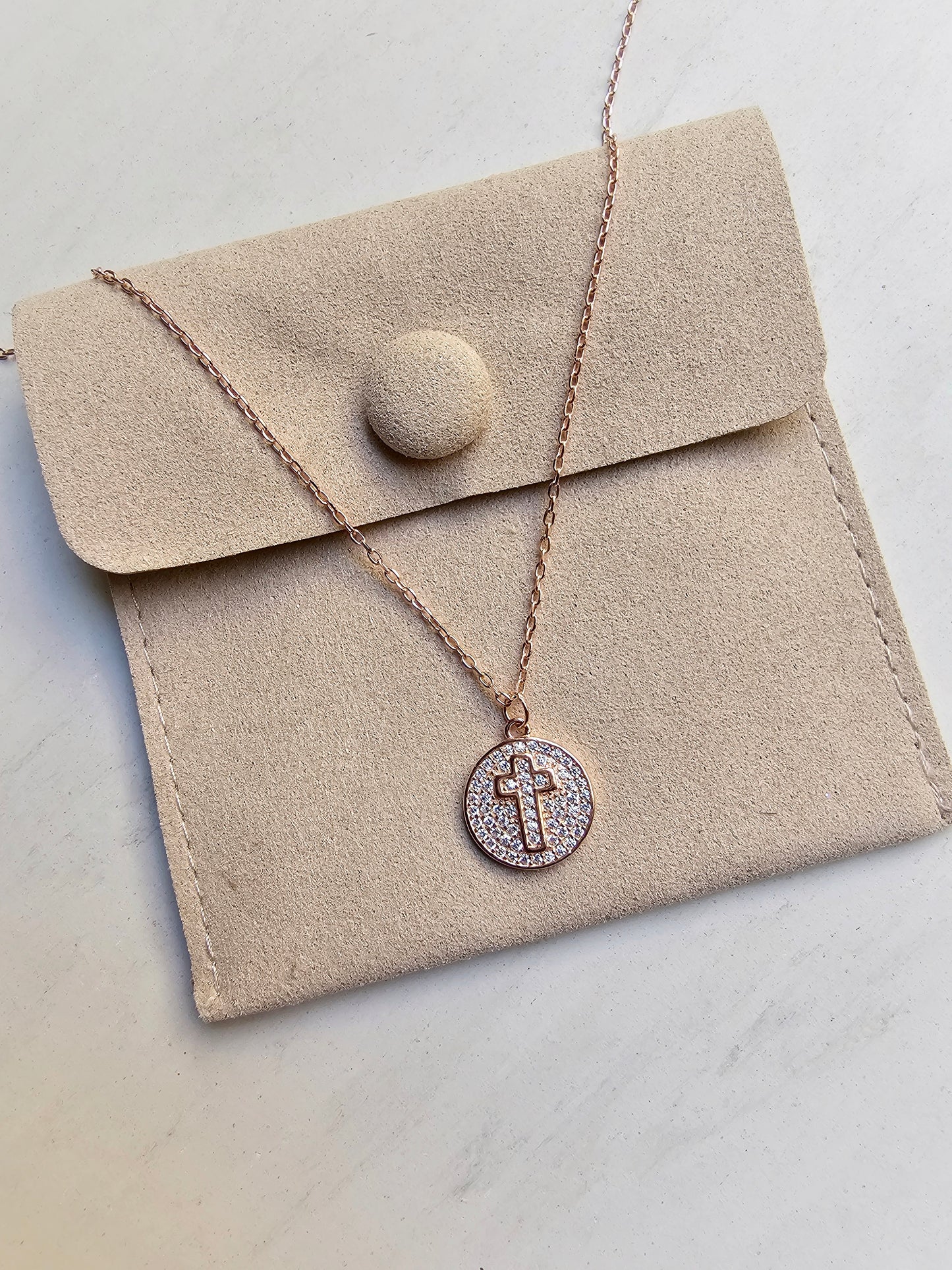 Rosegold cross medal