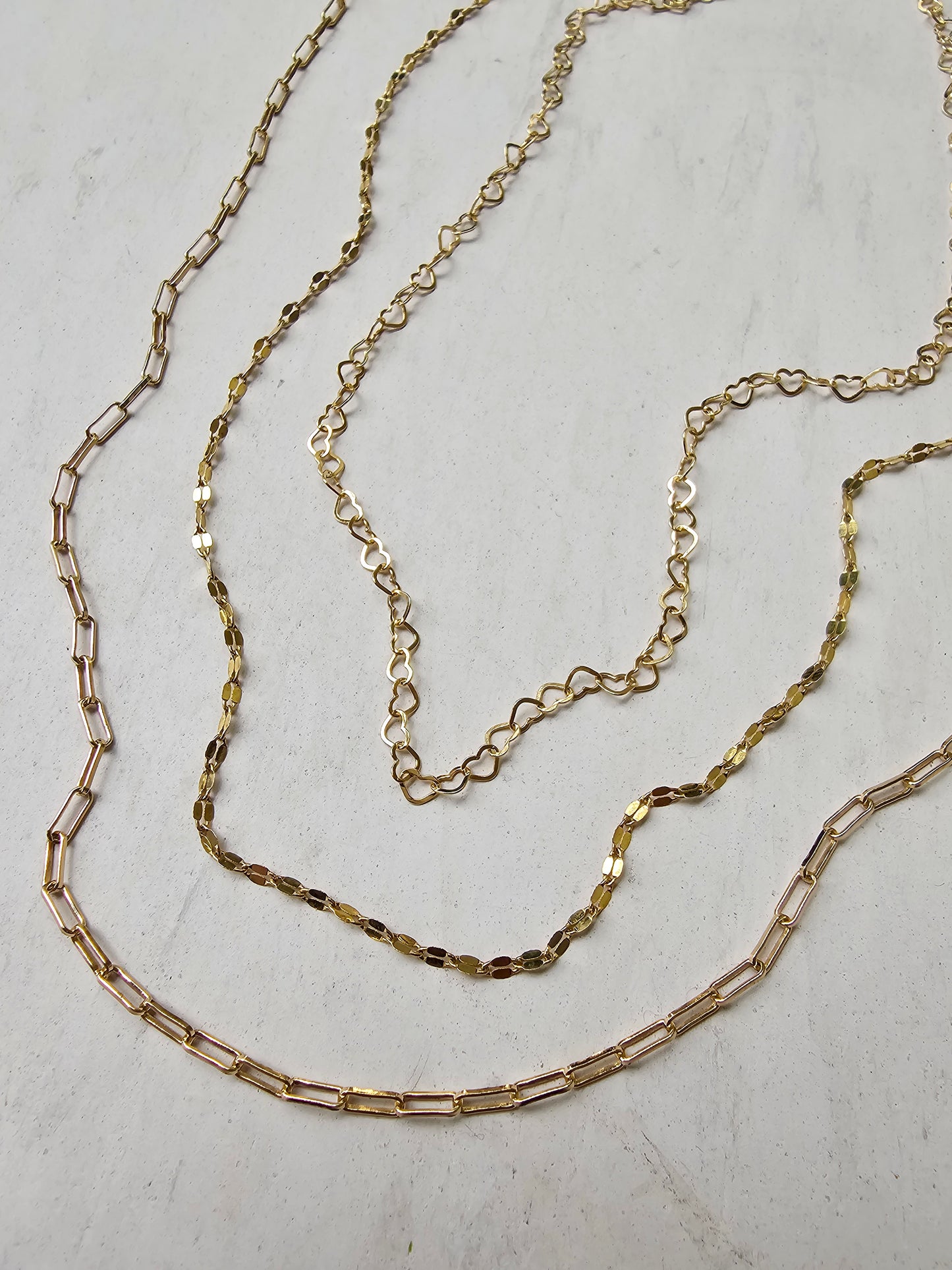 Golden layering necklaces