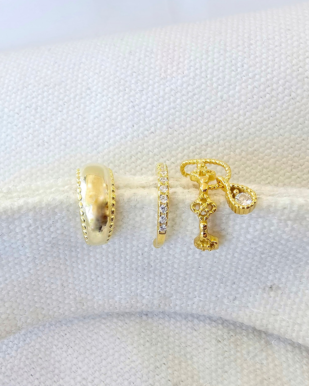 Golden sparkling earcuffs