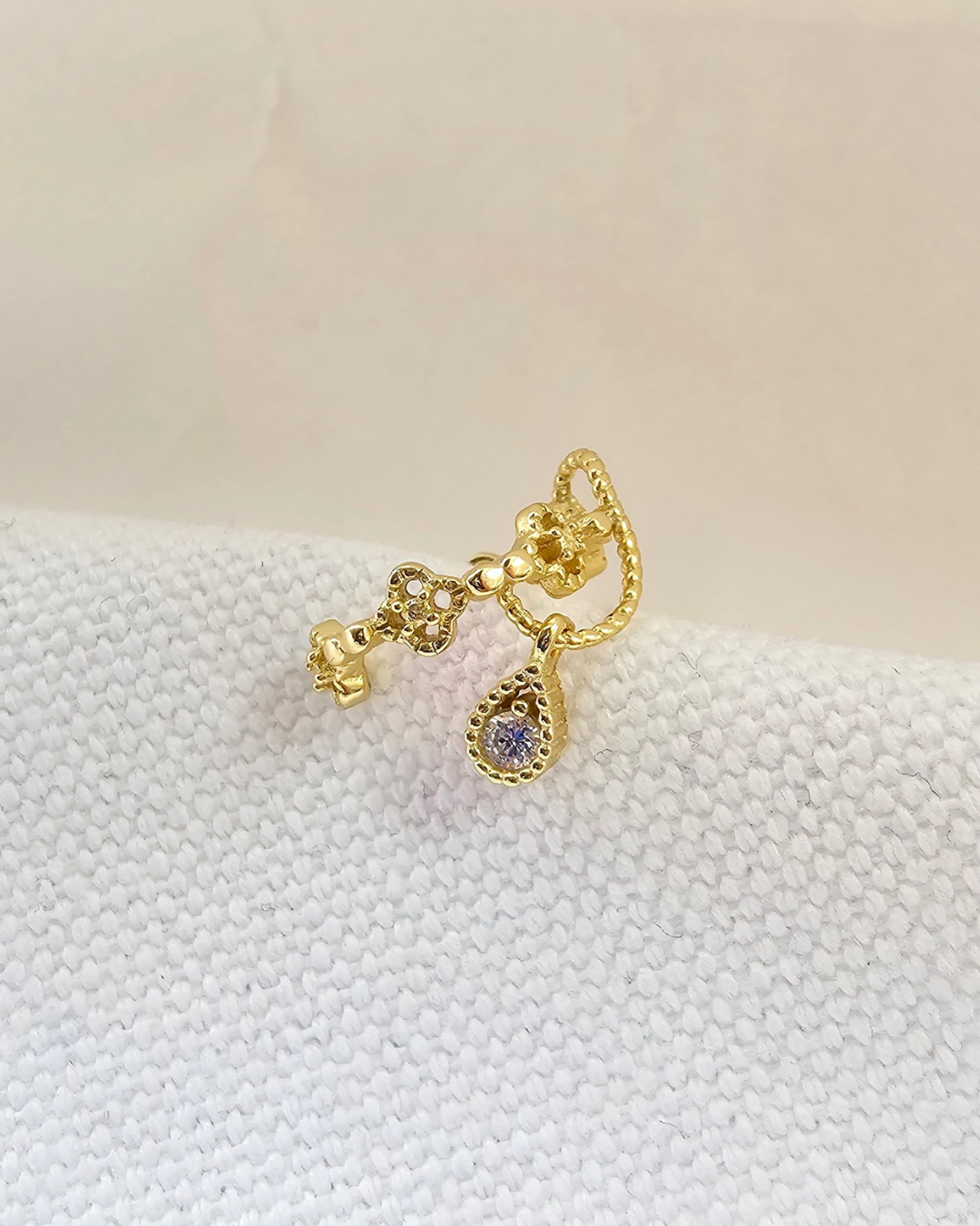 Golden sparkling earcuffs